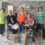 We delivered the batteries of their wheelchairs to our physically handicapped family